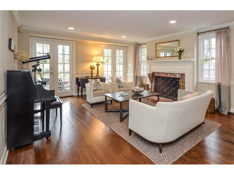 16 Willow Road Riverside, CT 06878 - Photo 14 of 24 a living room with furniture and a fireplace