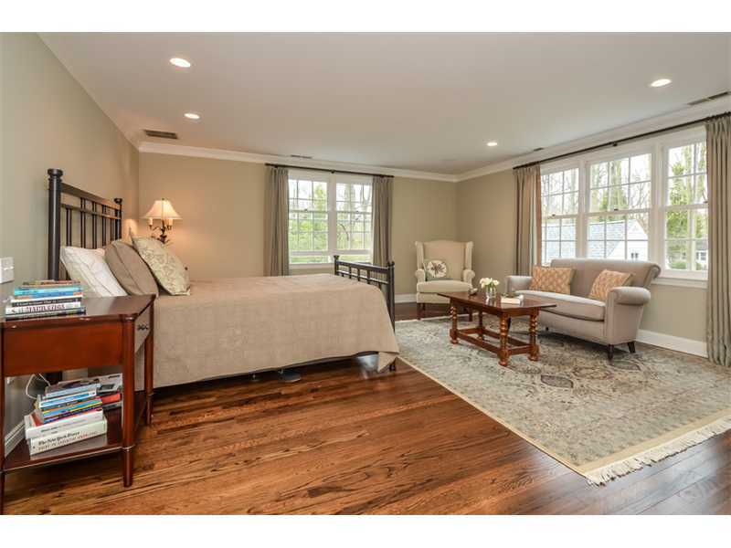 16 Willow Road Riverside, CT 06878 - Photo 16 of 24 a bedroom with furniture and a wooden floor