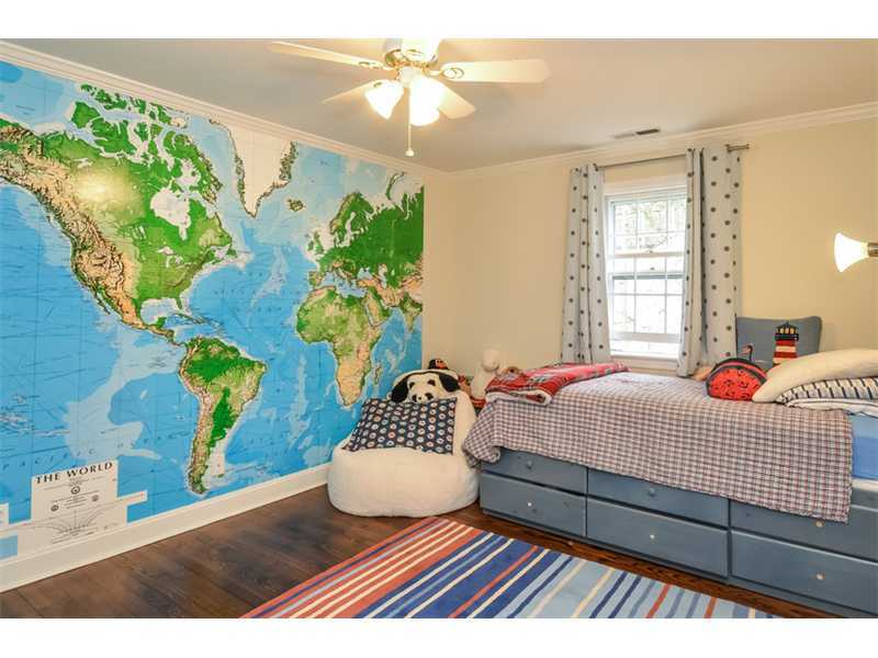 16 Willow Road Riverside, CT 06878 - Photo 19 of 24 a bedroom with a bed and a painting on the wall