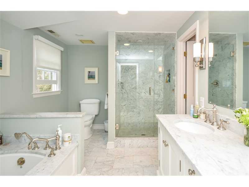 16 Willow Road Riverside, CT 06878 - Photo 23 of 24 a bathroom with a sink a toilet and shower