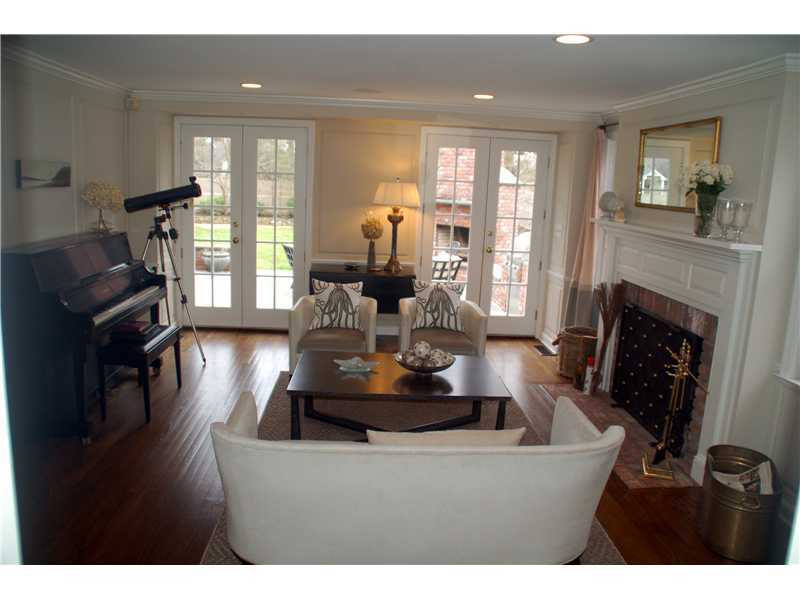 16 Willow Road Riverside, CT 06878 - Photo 5 of 24 a living room with furniture and a fireplace