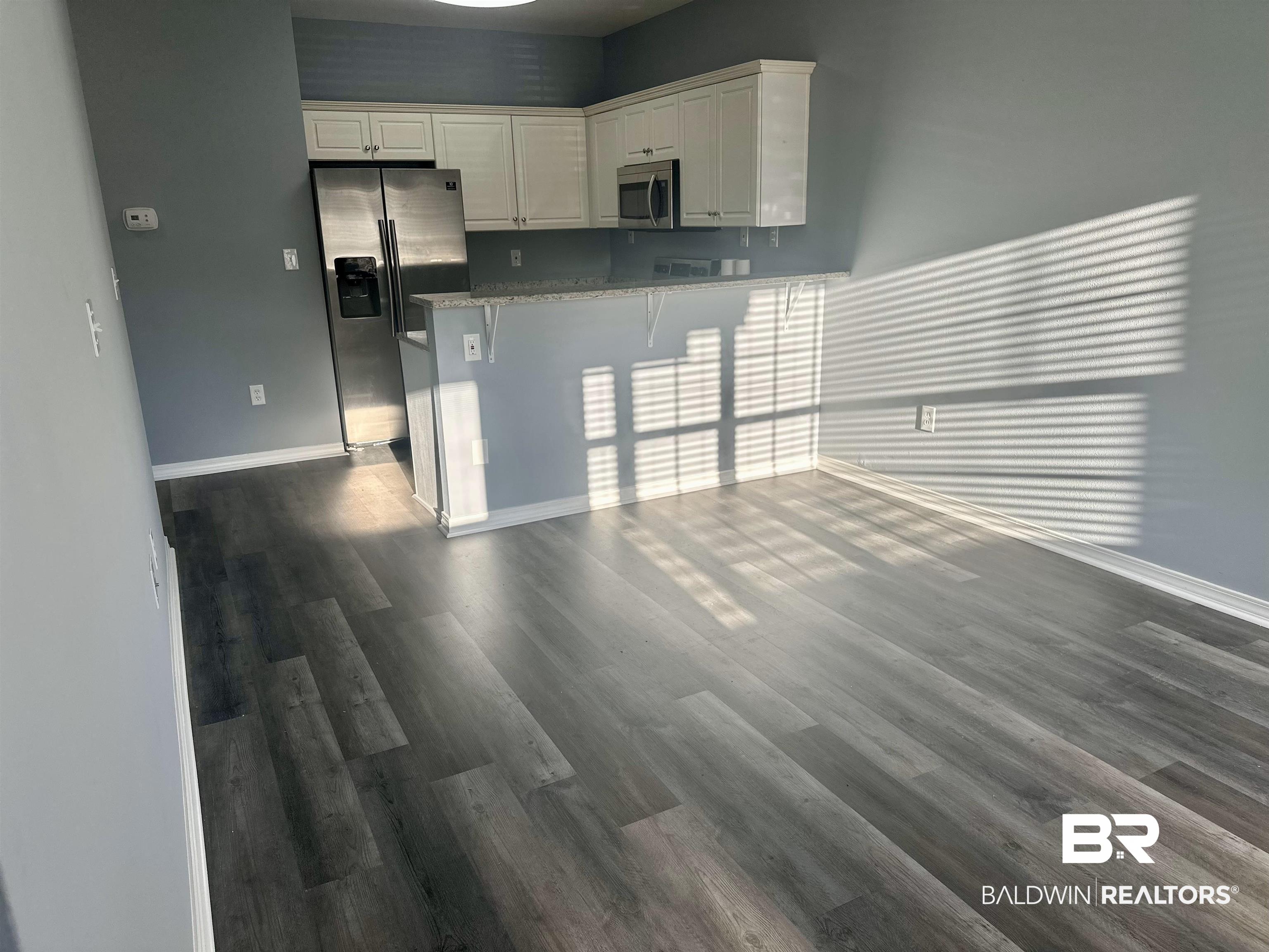 29449 Canal Road Orange Beach, AL 36561 - Photo 6 of 46 Livingroom and Kitchen