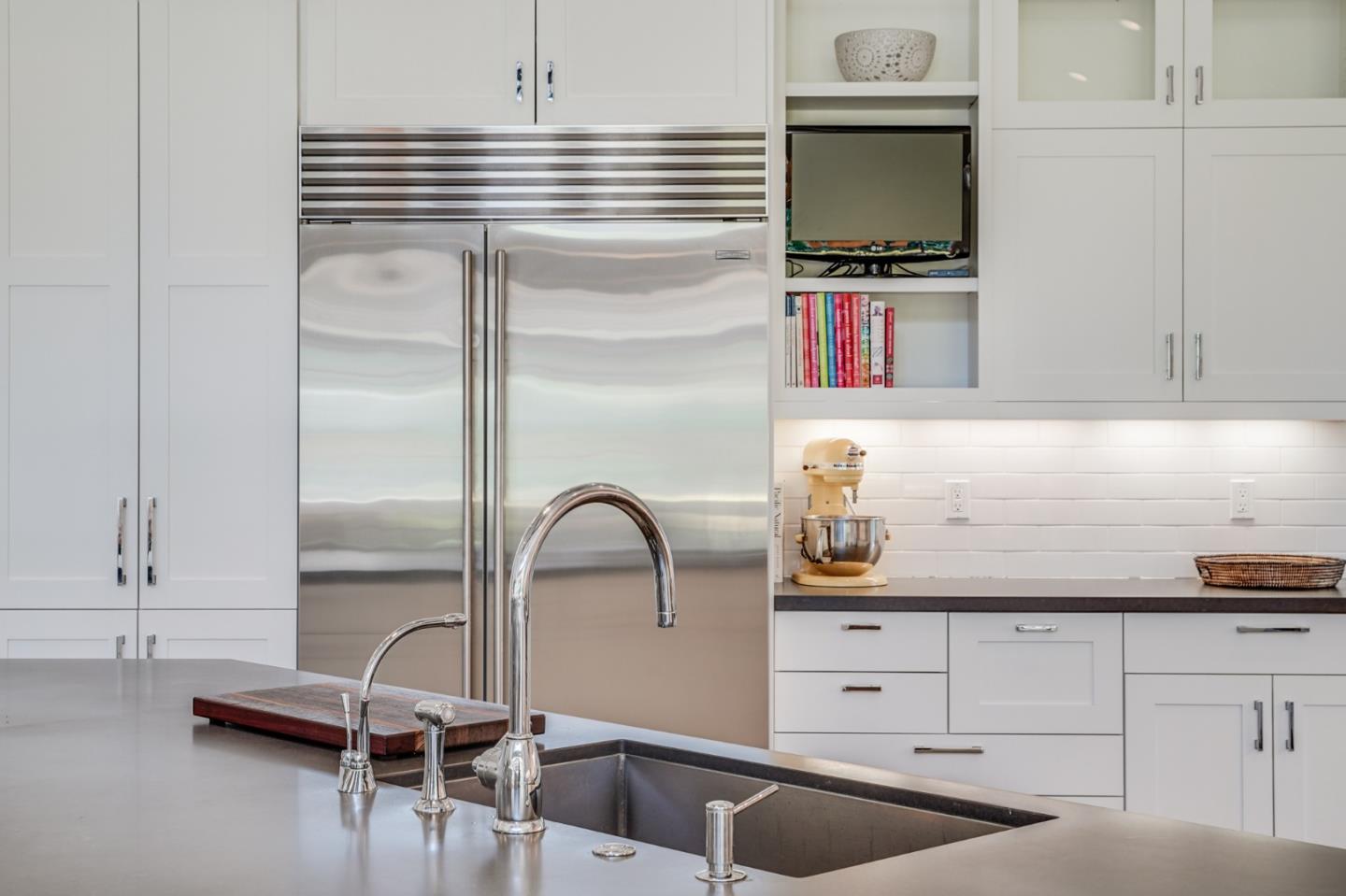 2533 Hayward Drive Burlingame, CA 94010 - Photo 13 of 47 a kitchen with a refrigerator and a sink