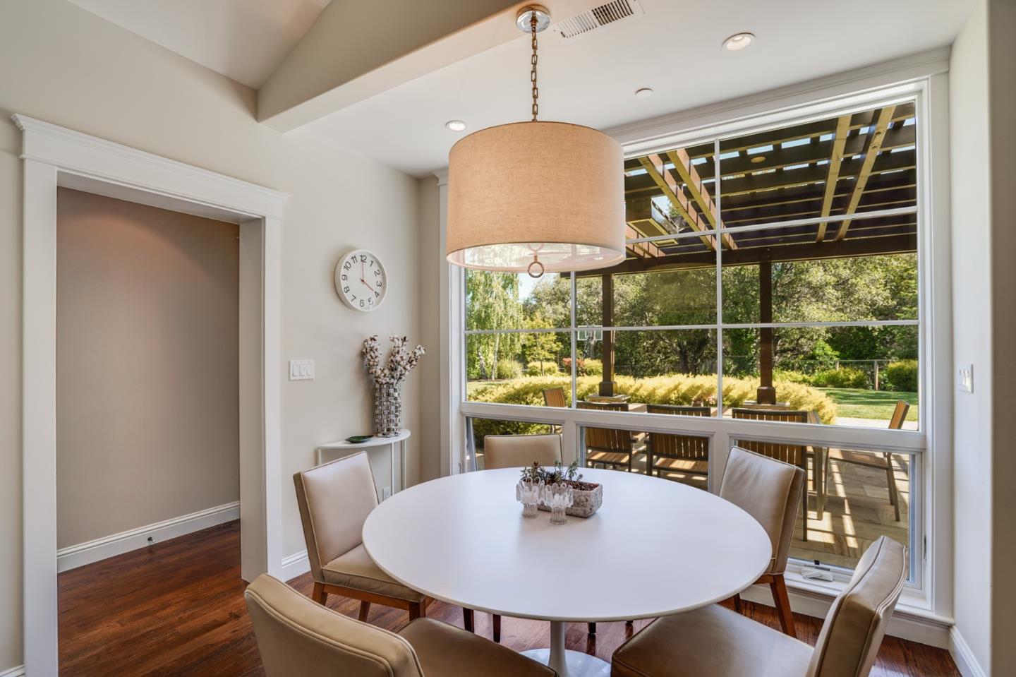 2533 Hayward Drive Burlingame, CA 94010 - Photo 16 of 47 a view of a dining room with furniture wooden floor and a chandelier