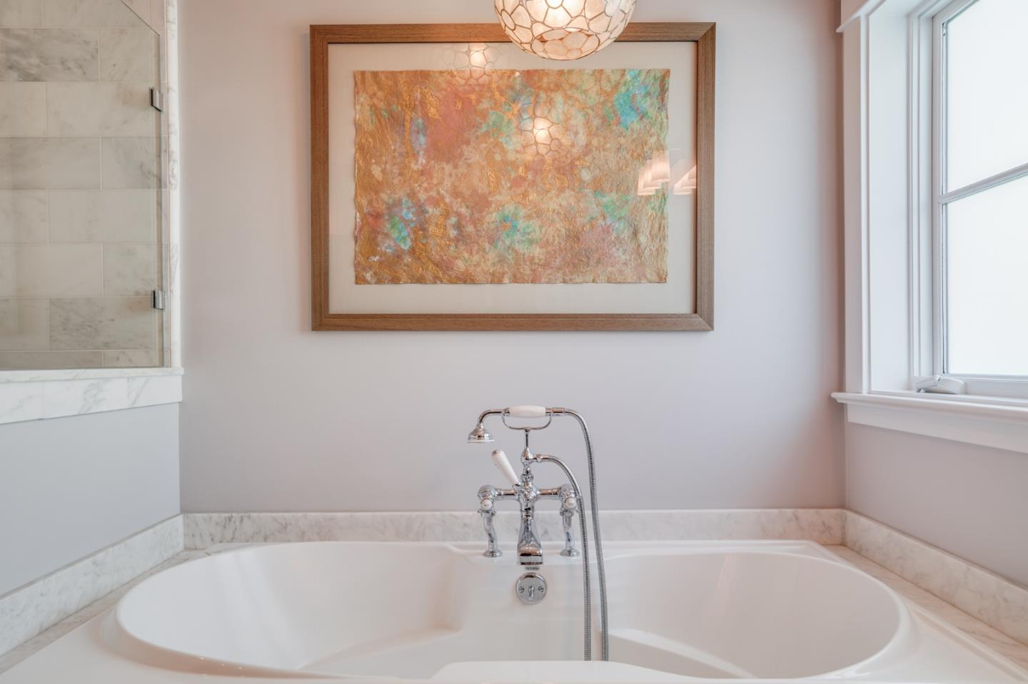 2533 Hayward Drive Burlingame, CA 94010 - Photo 27 of 47 a white bath tub sitting next to a window