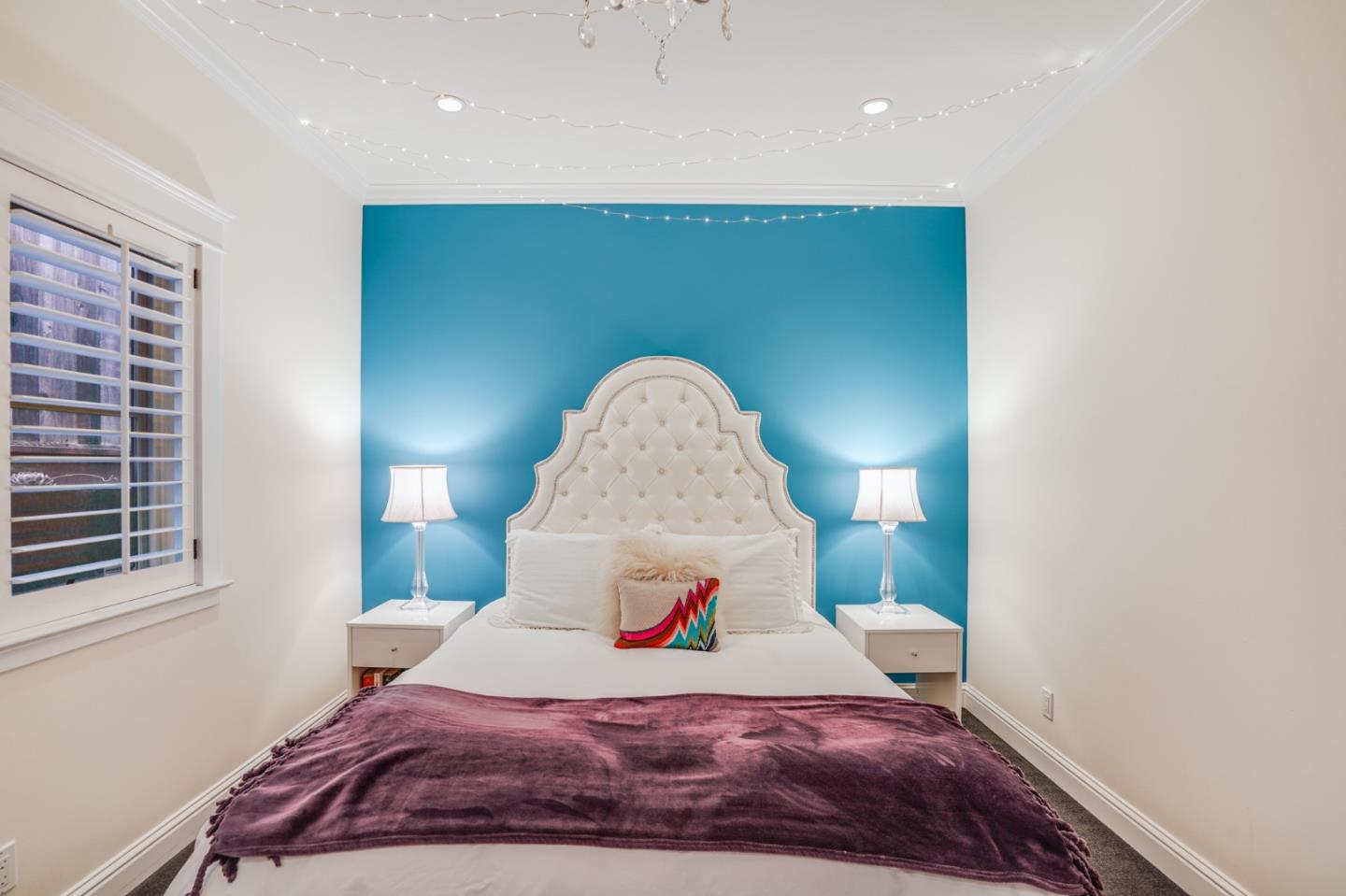 2533 Hayward Drive Burlingame, CA 94010 - Photo 31 of 47 a bedroom with a bed and a window