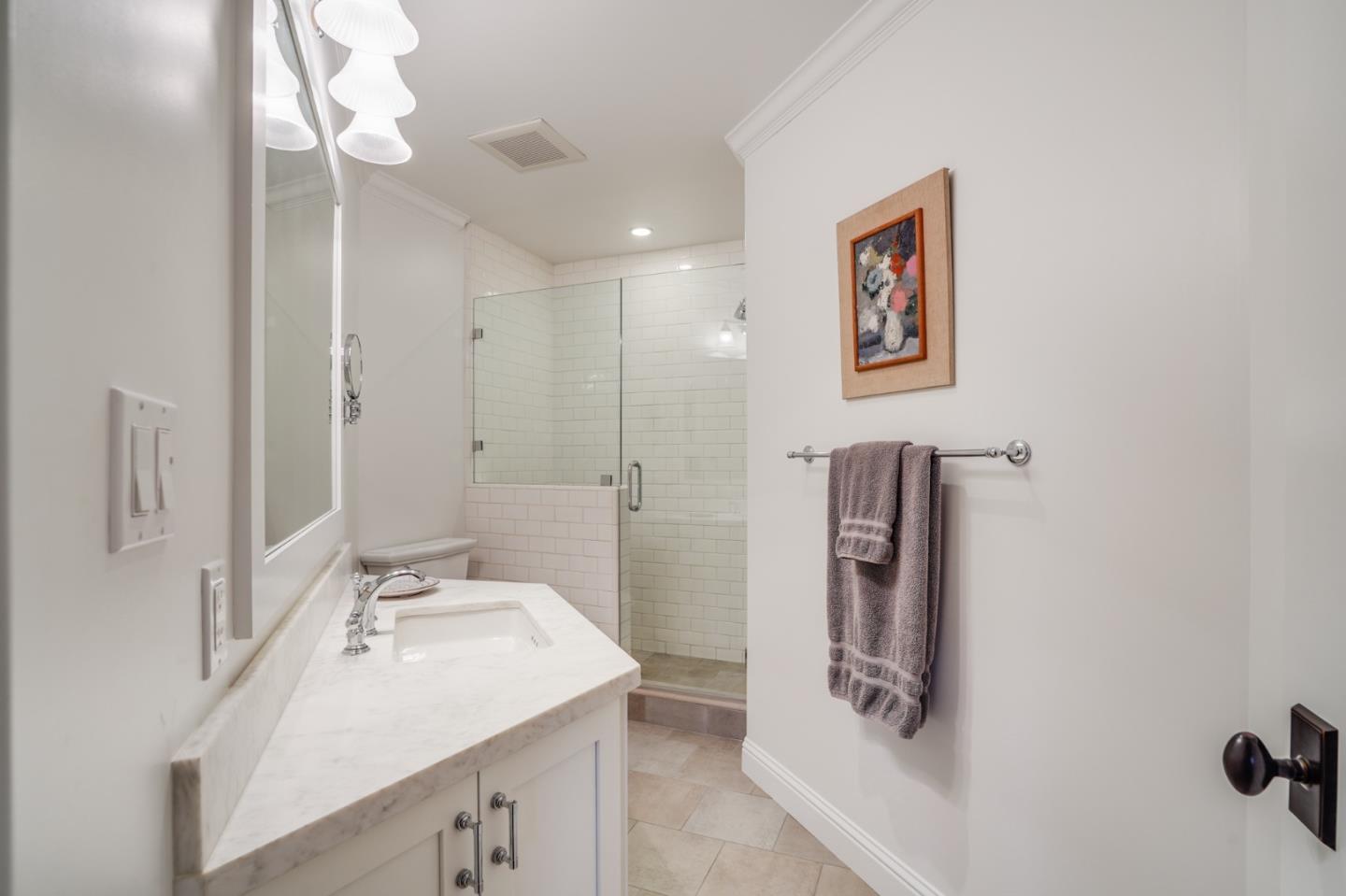 2533 Hayward Drive Burlingame, CA 94010 - Photo 33 of 47 a bathroom with a sink vanity and shower