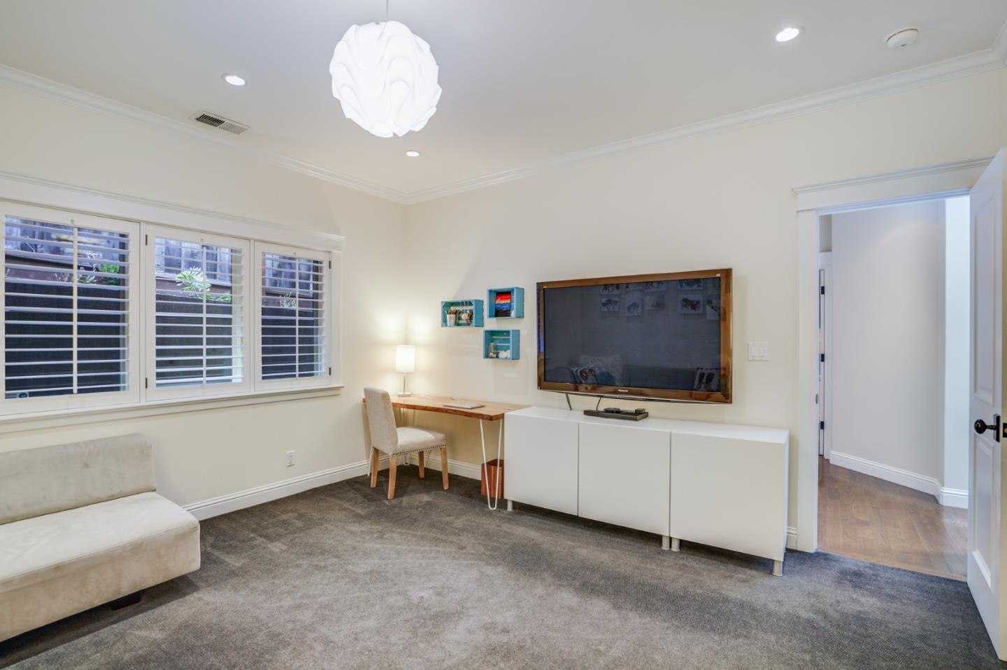 2533 Hayward Drive Burlingame, CA 94010 - Photo 36 of 47 a living room with furniture and a flat screen tv