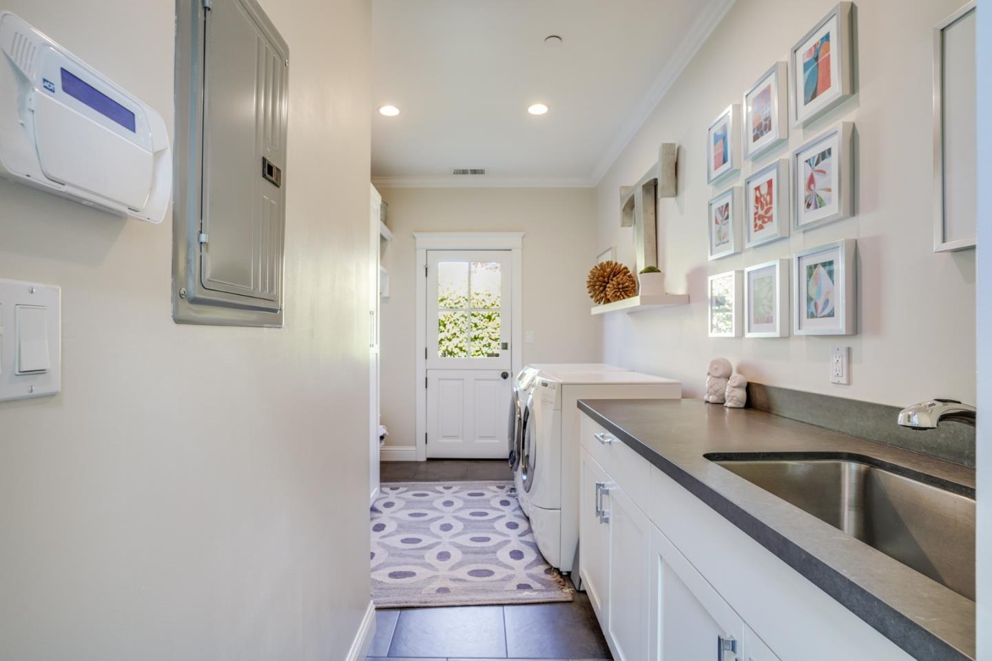 2533 Hayward Drive Burlingame, CA 94010 - Photo 38 of 47 a kitchen with cabinets a sink and a window
