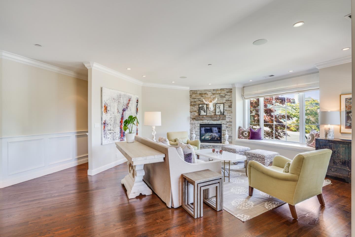 2533 Hayward Drive Burlingame, CA 94010 - Photo 5 of 47 a living room with fireplace furniture and a wooden floor