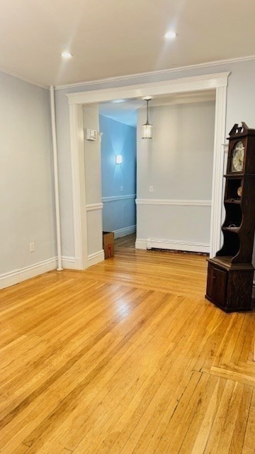 218 Wachusett Street, Unit 1 Boston, MA 02130 - Photo 16 of 21 a view of a room with wooden floor and closet