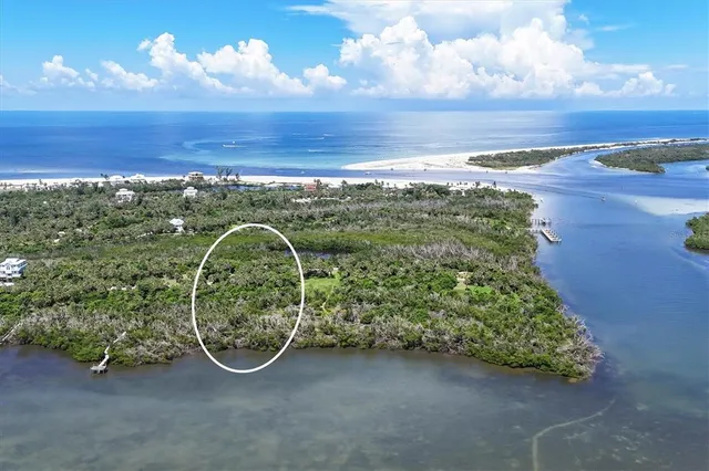 a view of an ocean and city