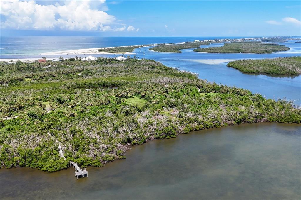 6040 Palm Point Way Boca Grande, FL 33921 - Photo 15 of 27 a view of an ocean and city