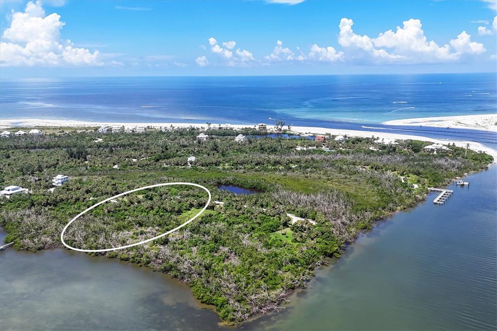 6040 Palm Point Way Boca Grande, FL 33921 - Photo 2 of 27 a view of a city