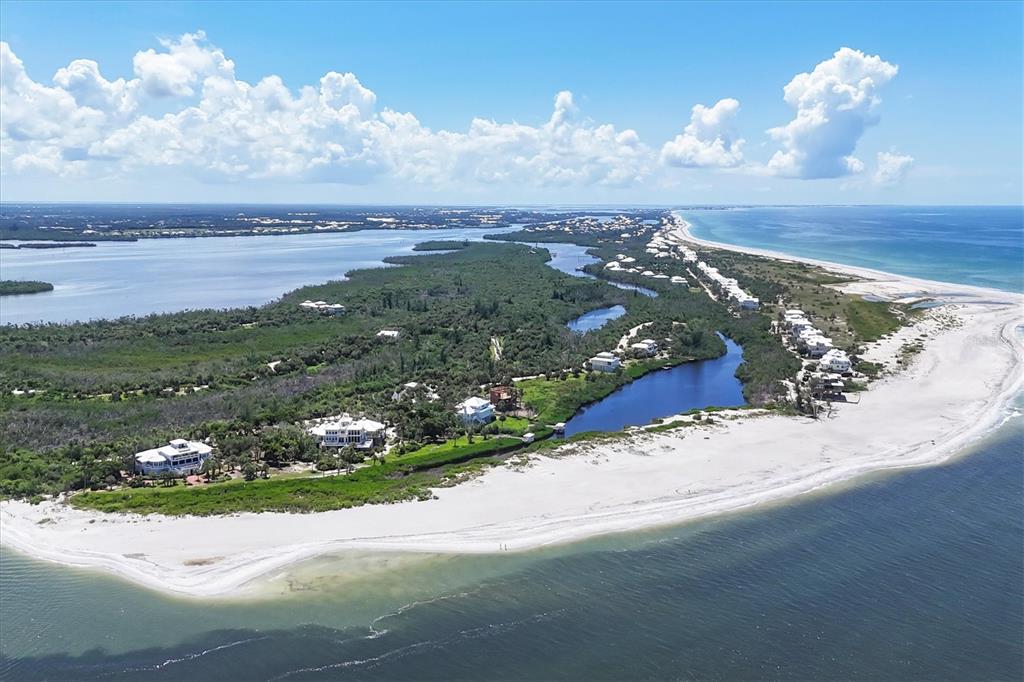 6040 Palm Point Way Boca Grande, FL 33921 - Photo 8 of 27 a view of a lake with a mountain