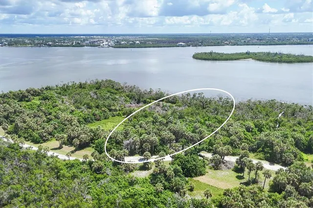 a view of a lake with a outdoor space