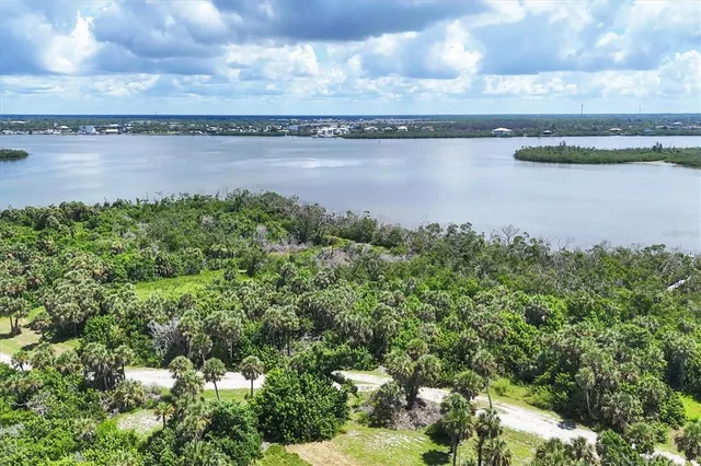 a view of a lake from a yard