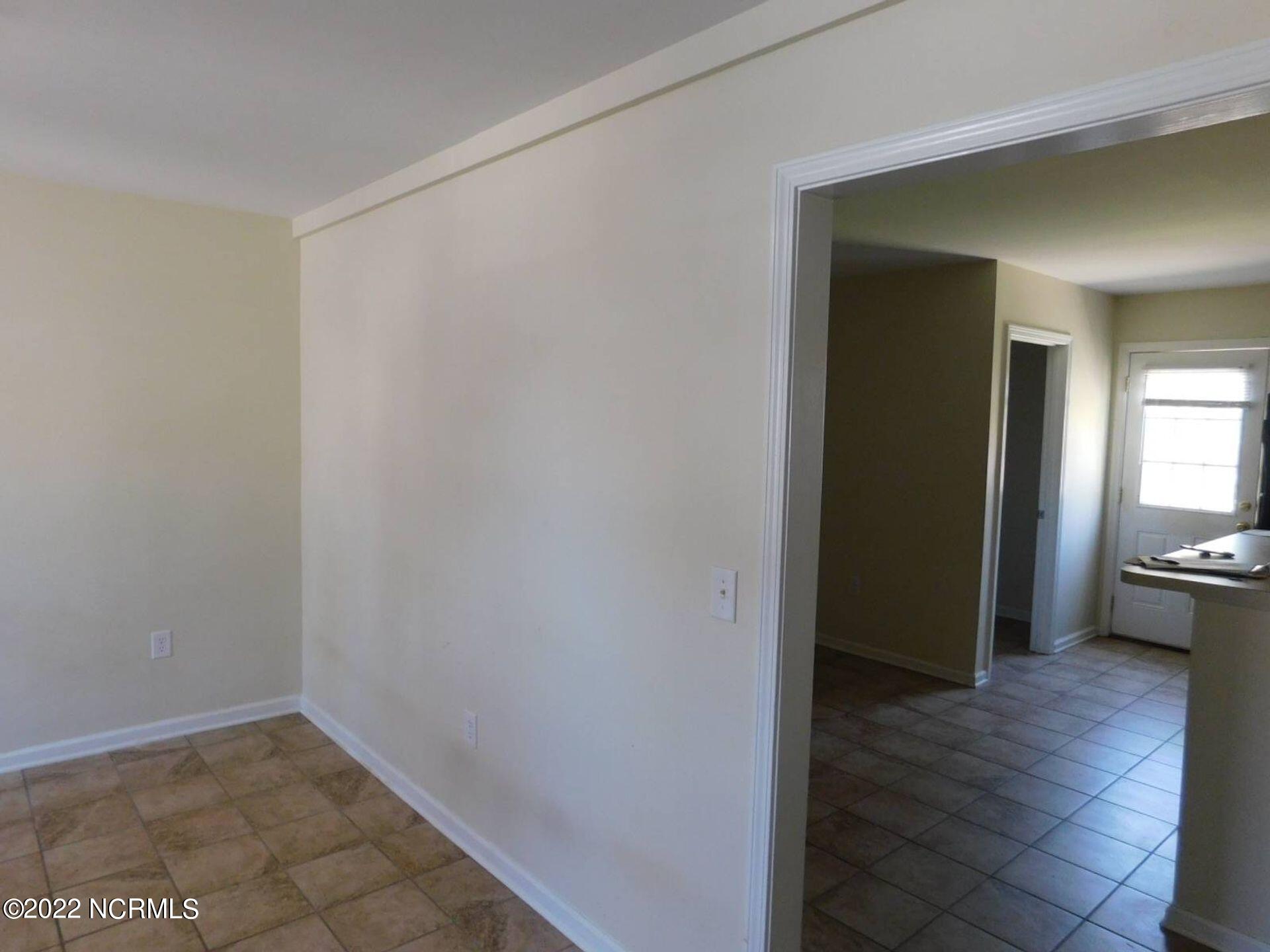 104 Apache Trail Havelock, NC 28532 - Photo 4 of 17 Living to kitchen