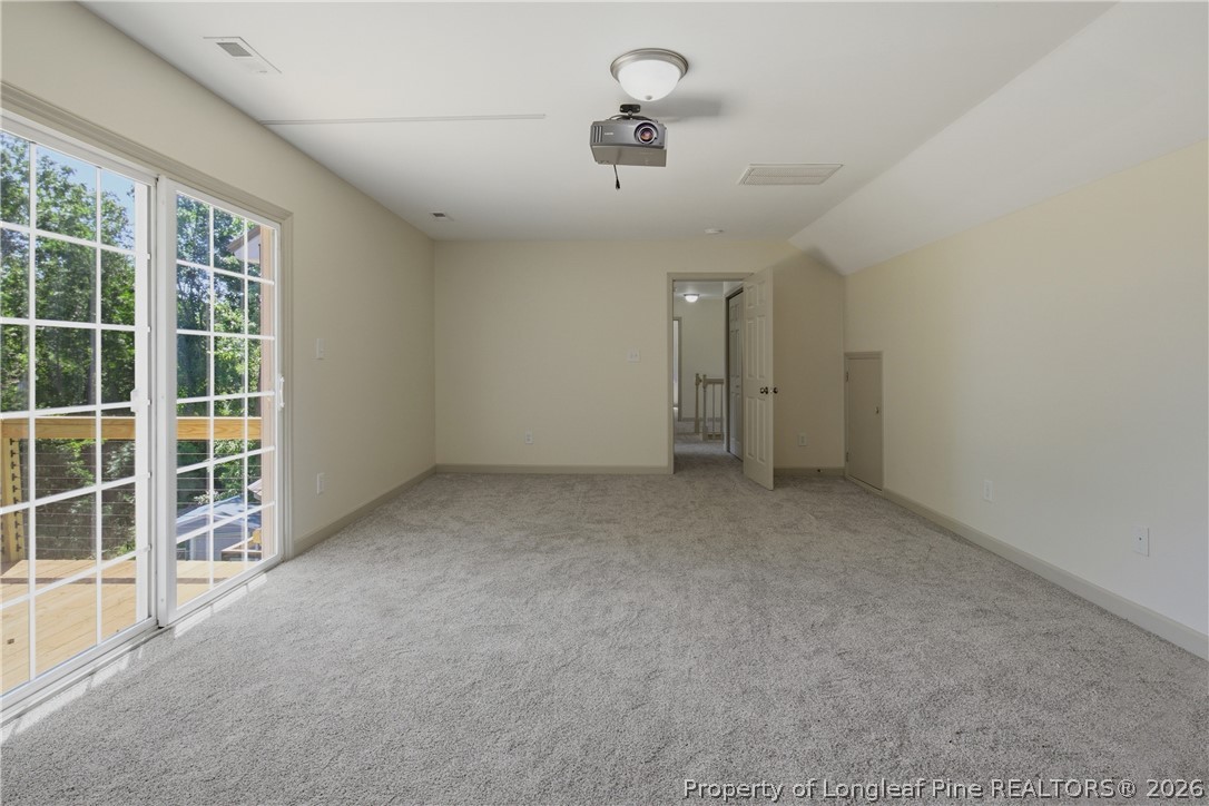 1075 Buffalo Lake Road Sanford, NC 27332 - Photo 38 of 49 an empty room with windows