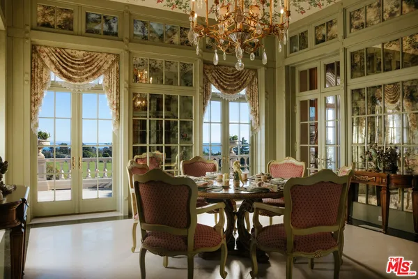 a view of a building from a dining room