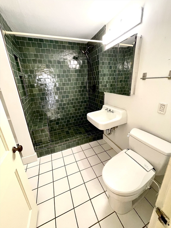 30 Landy Avenue Northampton, MA 01062 - Photo 13 of 40 a bathroom with a toilet a sink and shower