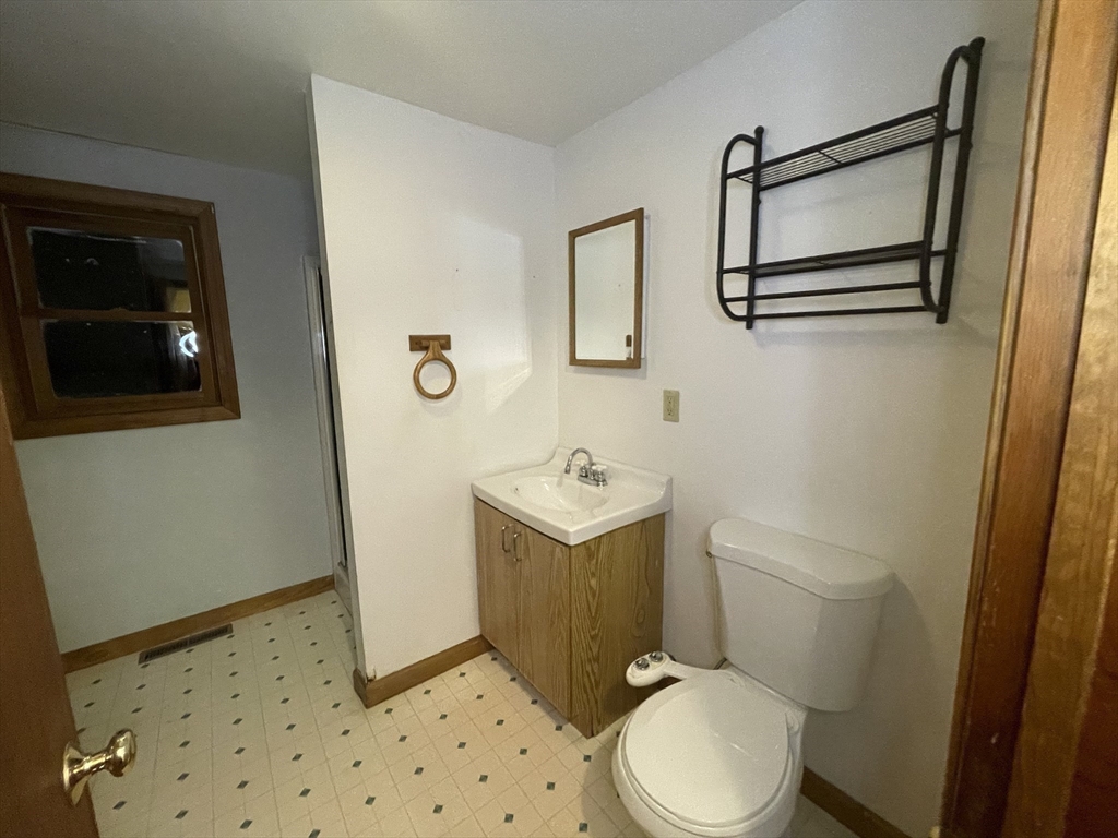 30 Landy Avenue Northampton, MA 01062 - Photo 24 of 40 a white toilet sitting next to a bathroom sink