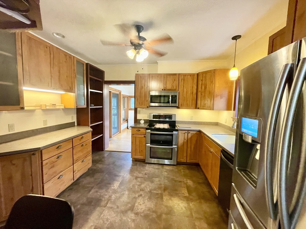 30 Landy Avenue Northampton, MA 01062 - Photo 4 of 40 a large kitchen with stainless steel appliances granite countertop a stove a sink dishwasher and a refrigerator