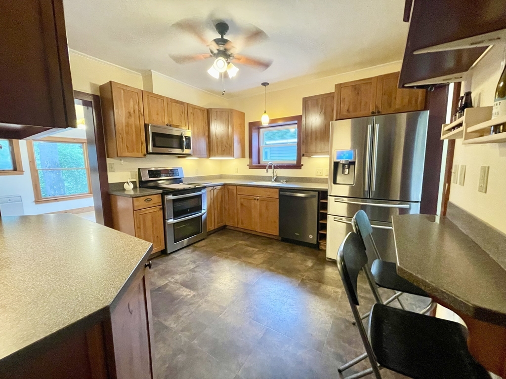 30 Landy Avenue Northampton, MA 01062 - Photo 5 of 40 a kitchen with stainless steel appliances granite countertop a sink stove and refrigerator