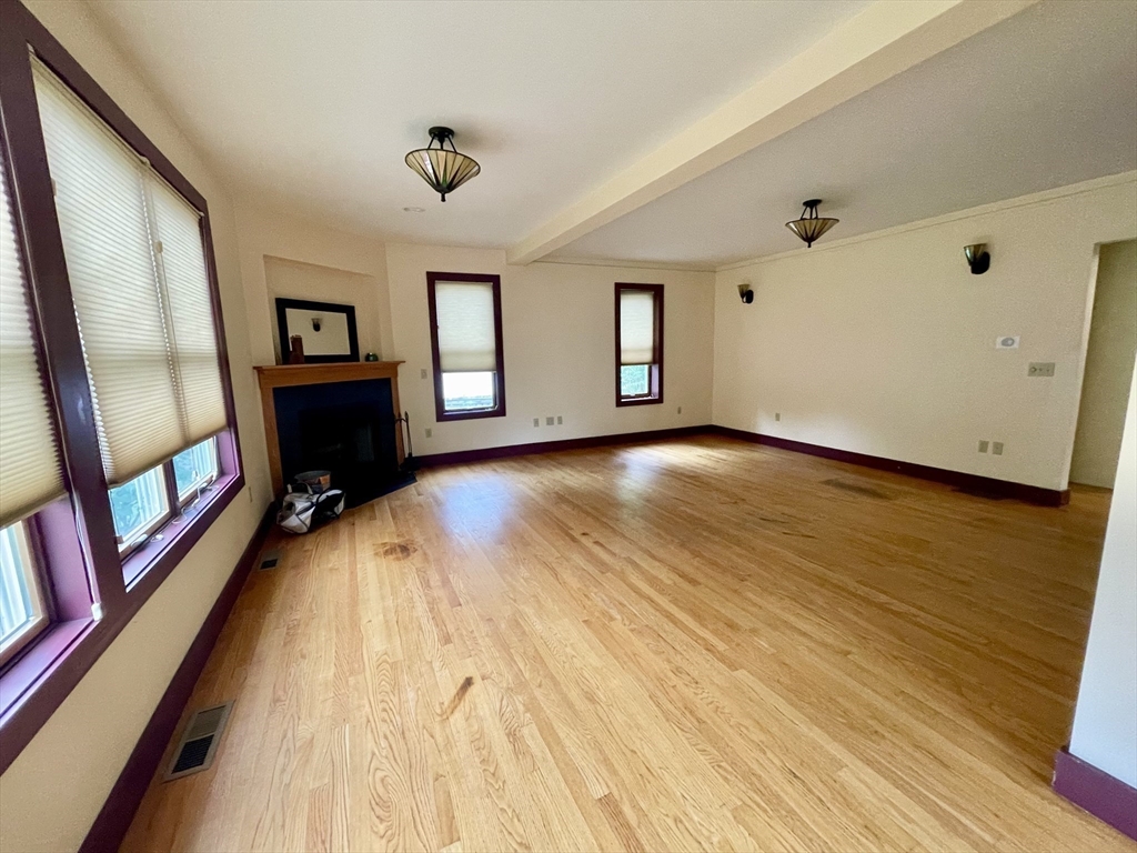 30 Landy Avenue Northampton, MA 01062 - Photo 9 of 40 a view of a hardwood floor in a hall with wooden floors