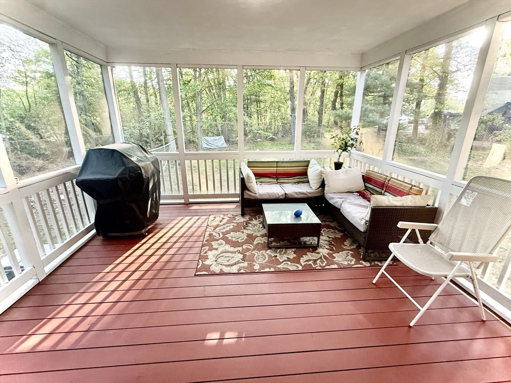 19 Fairview Road, Unit A Framingham, MA 01702 - Photo 7 of 28 a living room with furniture and a large window