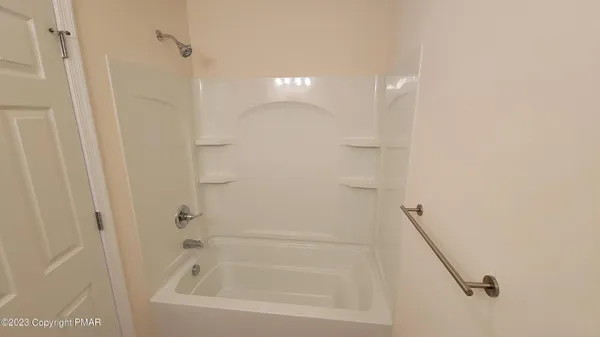 a bathroom with a bathtub