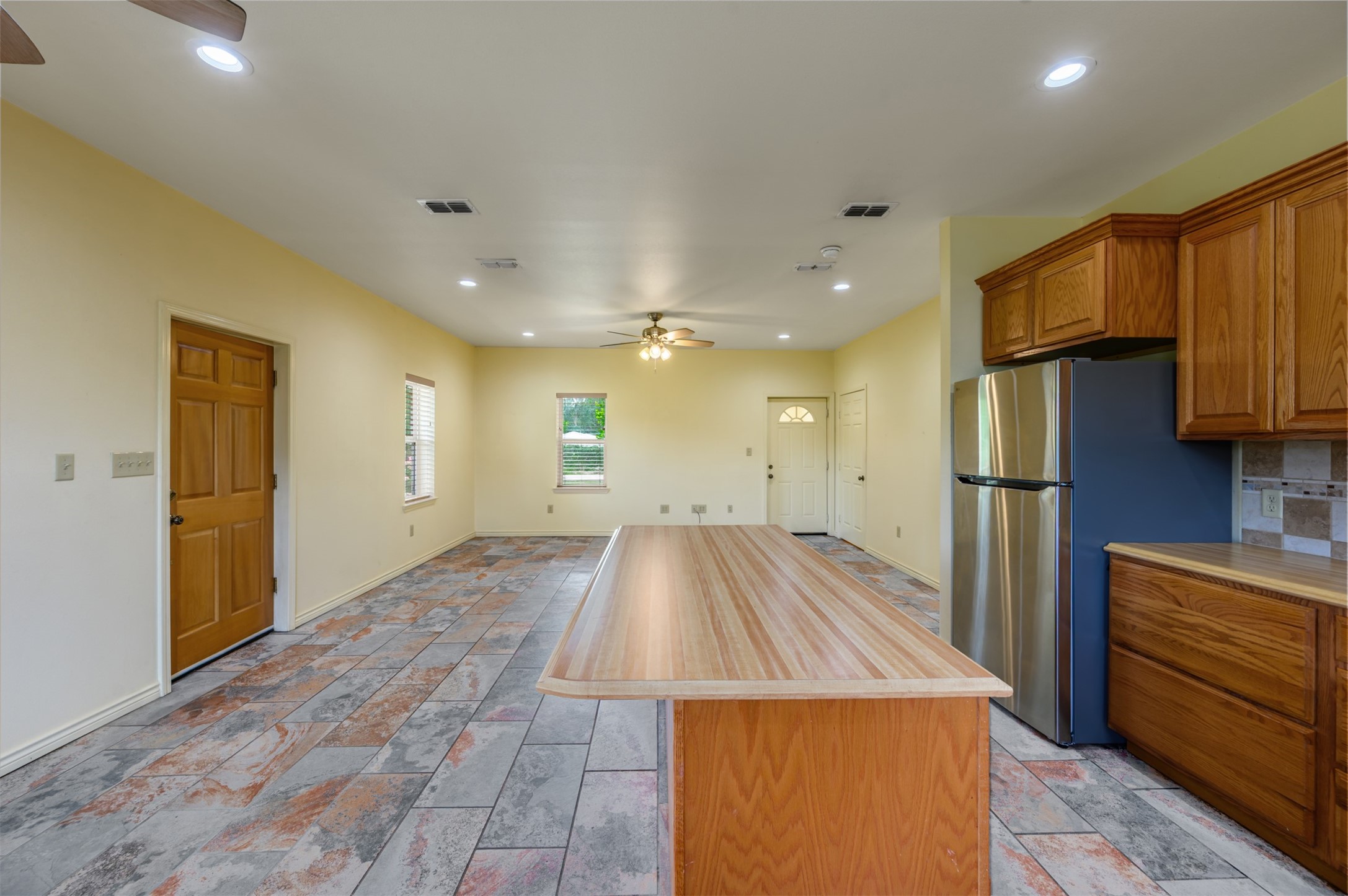 531 County Road 3501 Cuney, TX 75759 - Photo 15 of 45 a view of kitchen with stainless steel appliances refrigerator stove and wooden cabinets