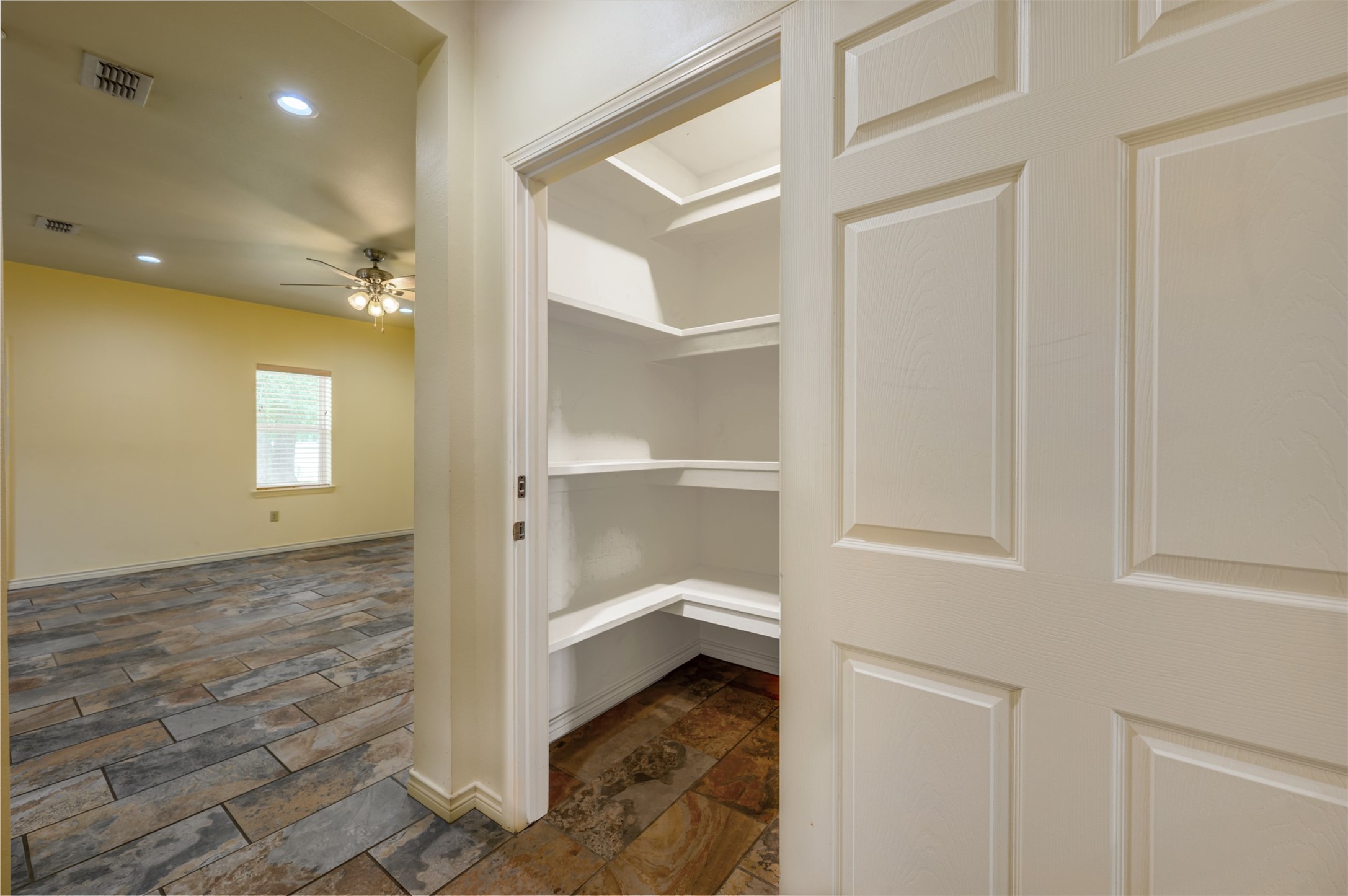 531 County Road 3501 Cuney, TX 75759 - Photo 22 of 45 a view of a hallway with wooden shelves