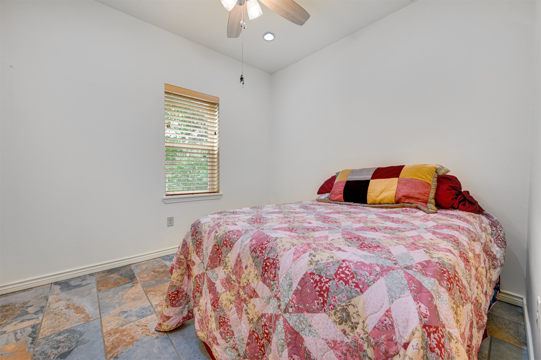 531 County Road 3501 Cuney, TX 75759 - Photo 30 of 45 a bedroom with a bed and a window