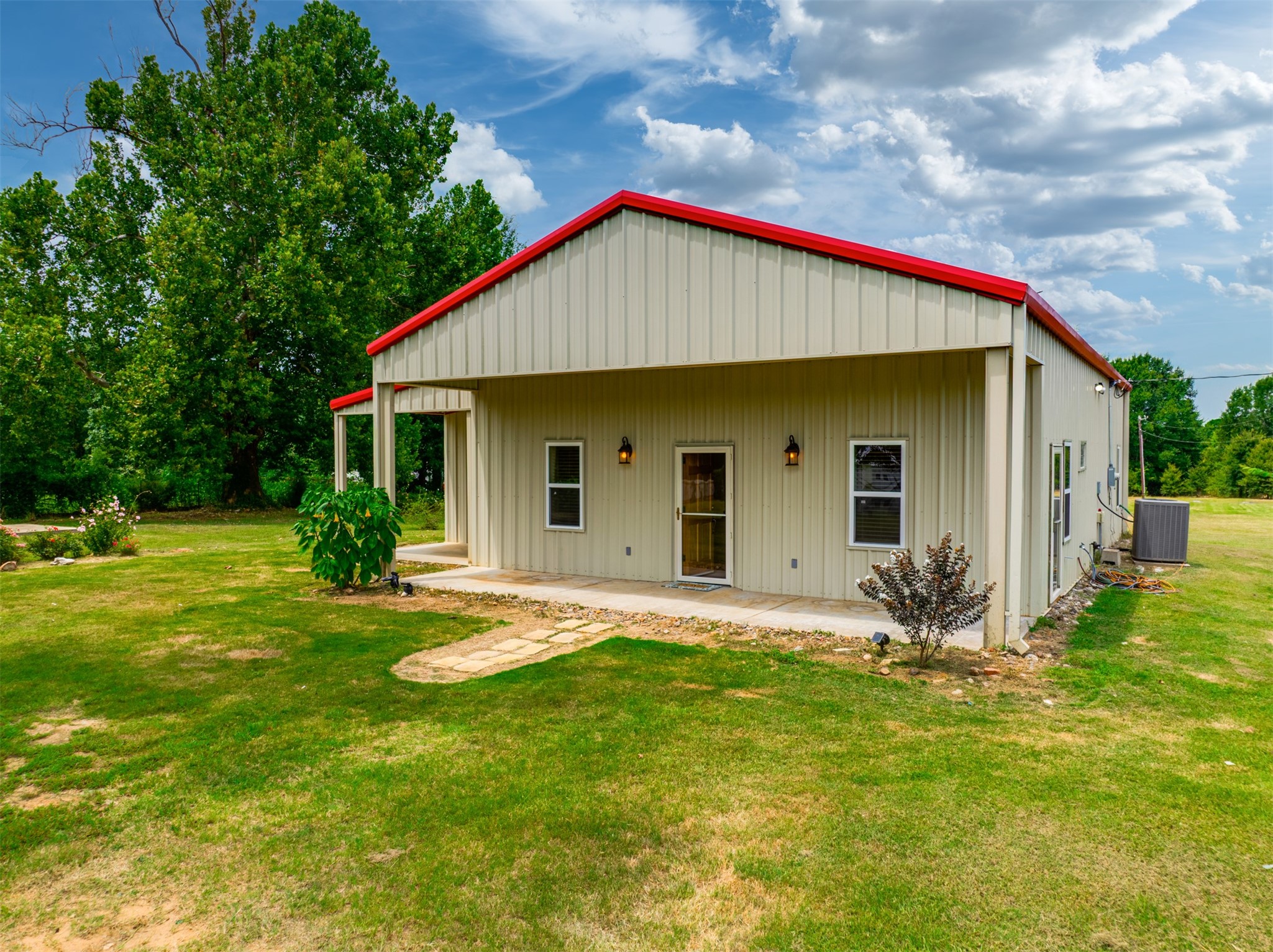531 County Road 3501 Cuney, TX 75759 - Photo 3 of 45 a backyard of a house with table and chairs