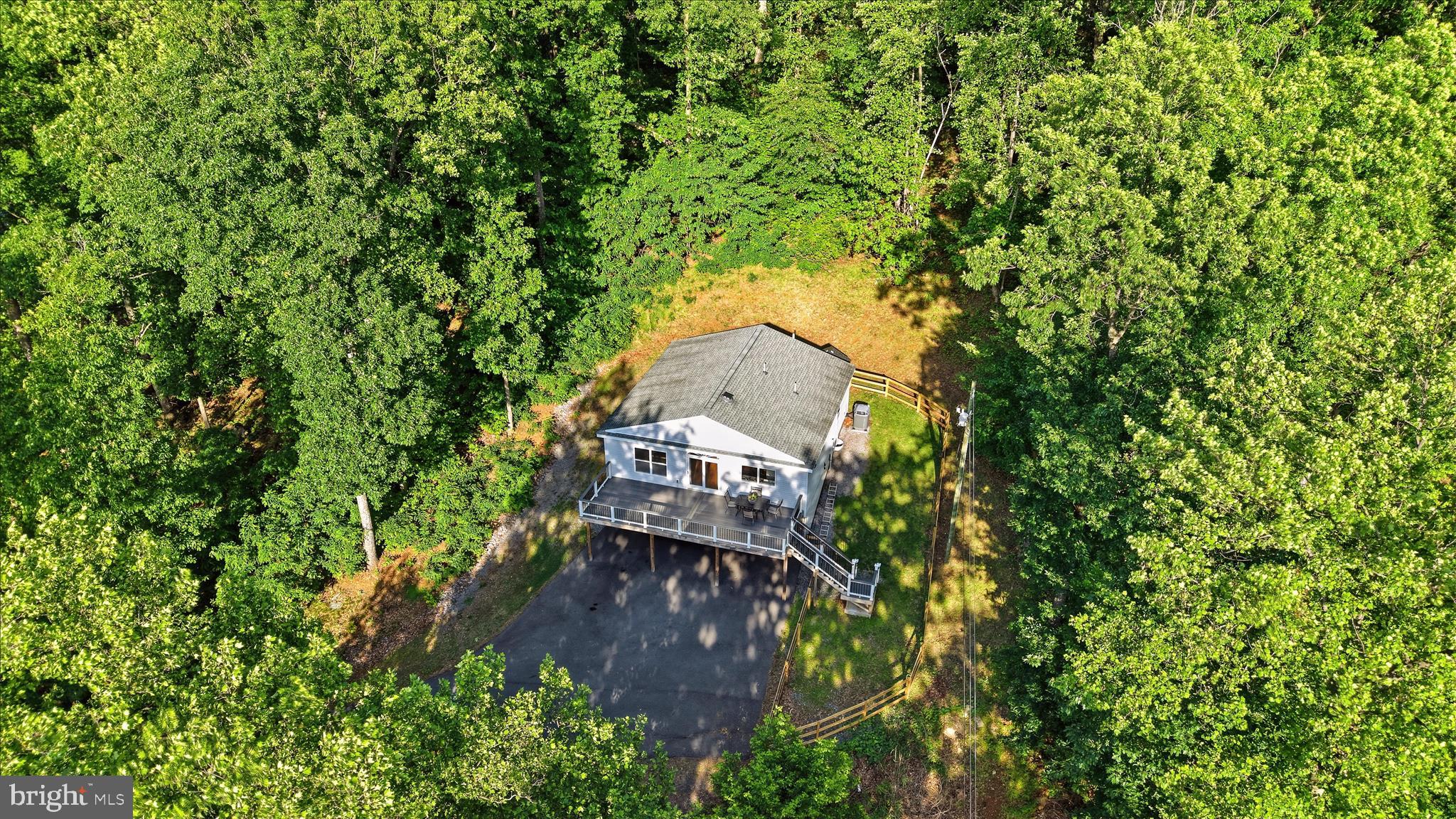 500 Delicious Road Linden, VA 22642 - Photo 56 of 80 an aerial view of a house with a yard
