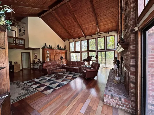 a view of kitchen with sink and wooden floor