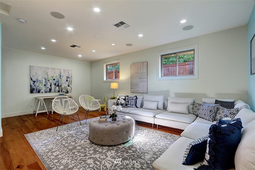 16912 Talbot Road Edmonds, WA 98026 - Photo 19 of 40 a living room with furniture and a potted plant