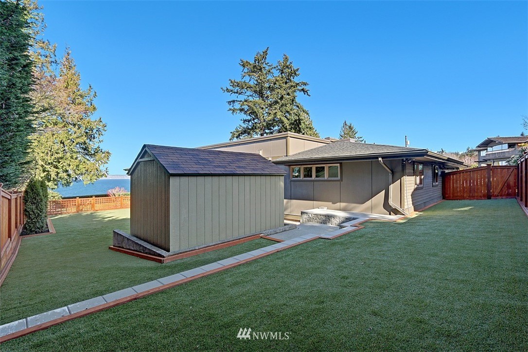 16912 Talbot Road Edmonds, WA 98026 - Photo 35 of 40 a view of a backyard with a garden and entertaining space