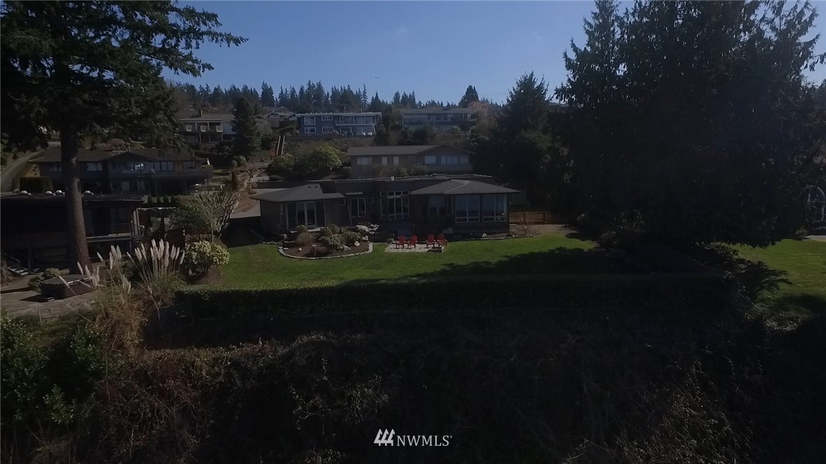 16912 Talbot Road Edmonds, WA 98026 - Photo 37 of 40 a view of a house with a yard