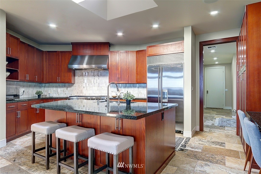 16912 Talbot Road Edmonds, WA 98026 - Photo 5 of 40 a kitchen with stainless steel appliances granite countertop a sink and a refrigerator