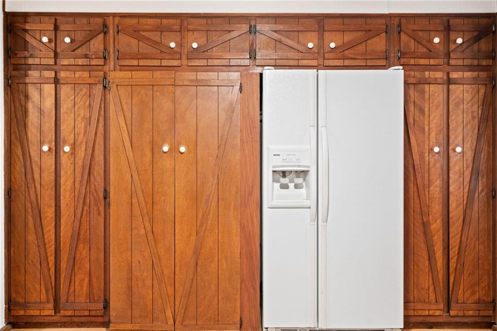 1996 Thomas Road Canton, GA 30115 - Photo 10 of 48 a bathroom with a shower curtain and a sink