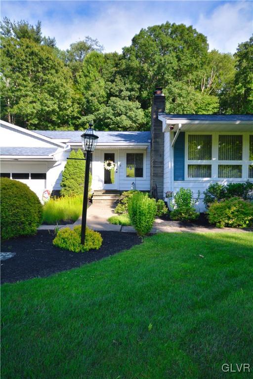 2555 Chase Road Shavertown, PA 18708 - Photo 2 of 21 a view of a house with a backyard and a patio