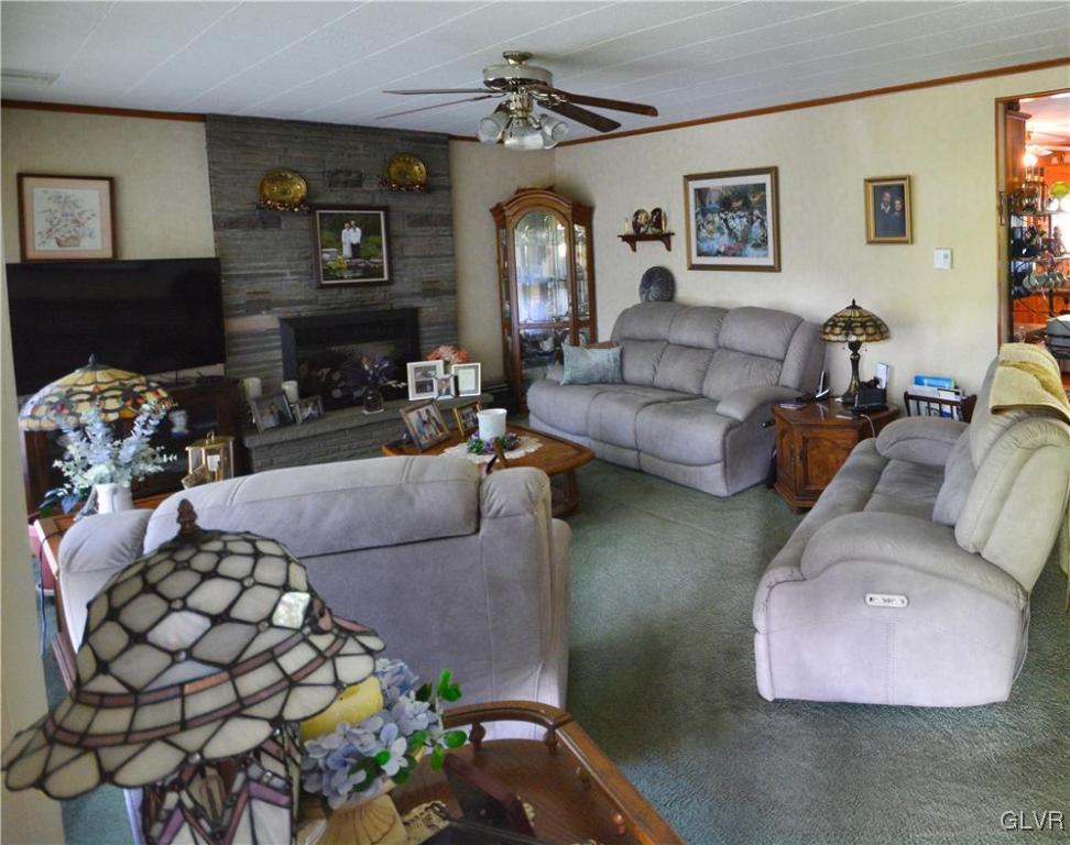 2555 Chase Road Shavertown, PA 18708 - Photo 4 of 21 a living room with furniture and a fireplace