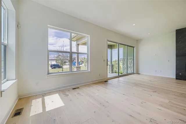 an empty room with windows