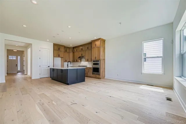 a view of kitchen and windows