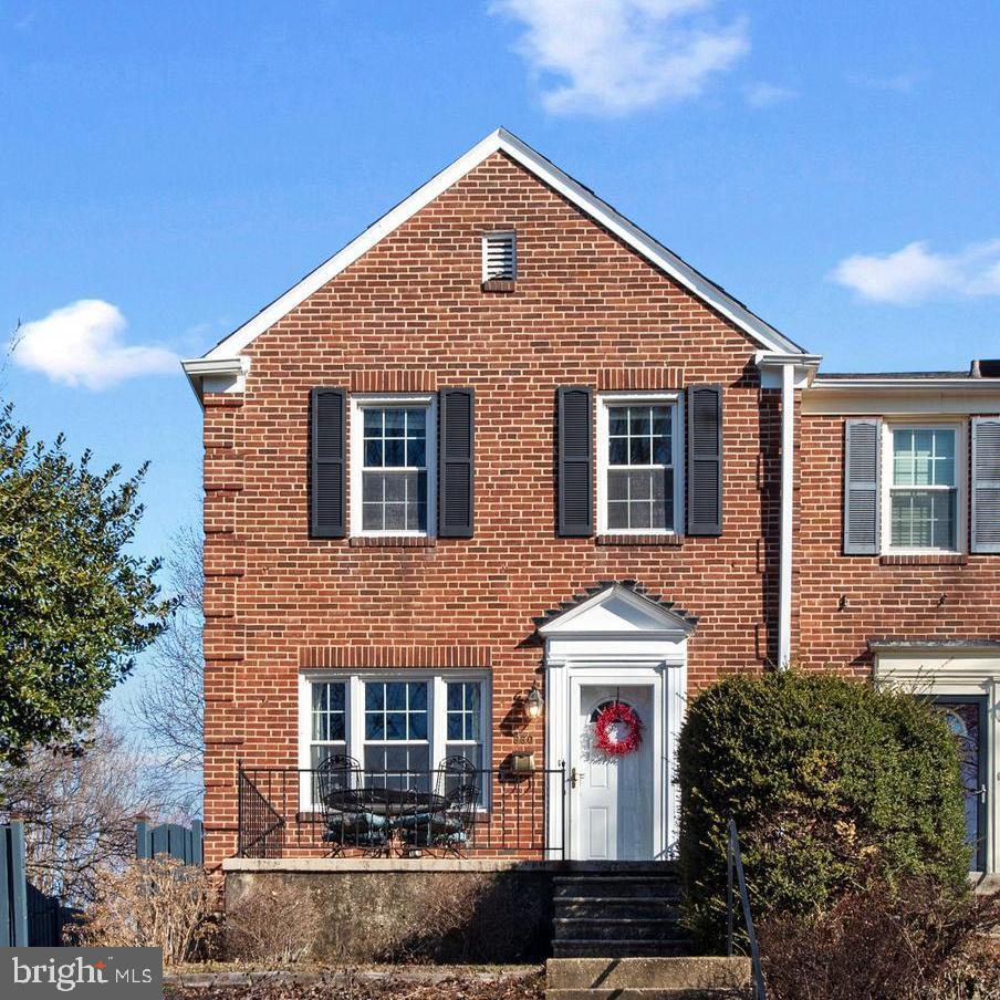a front view of a house with yard