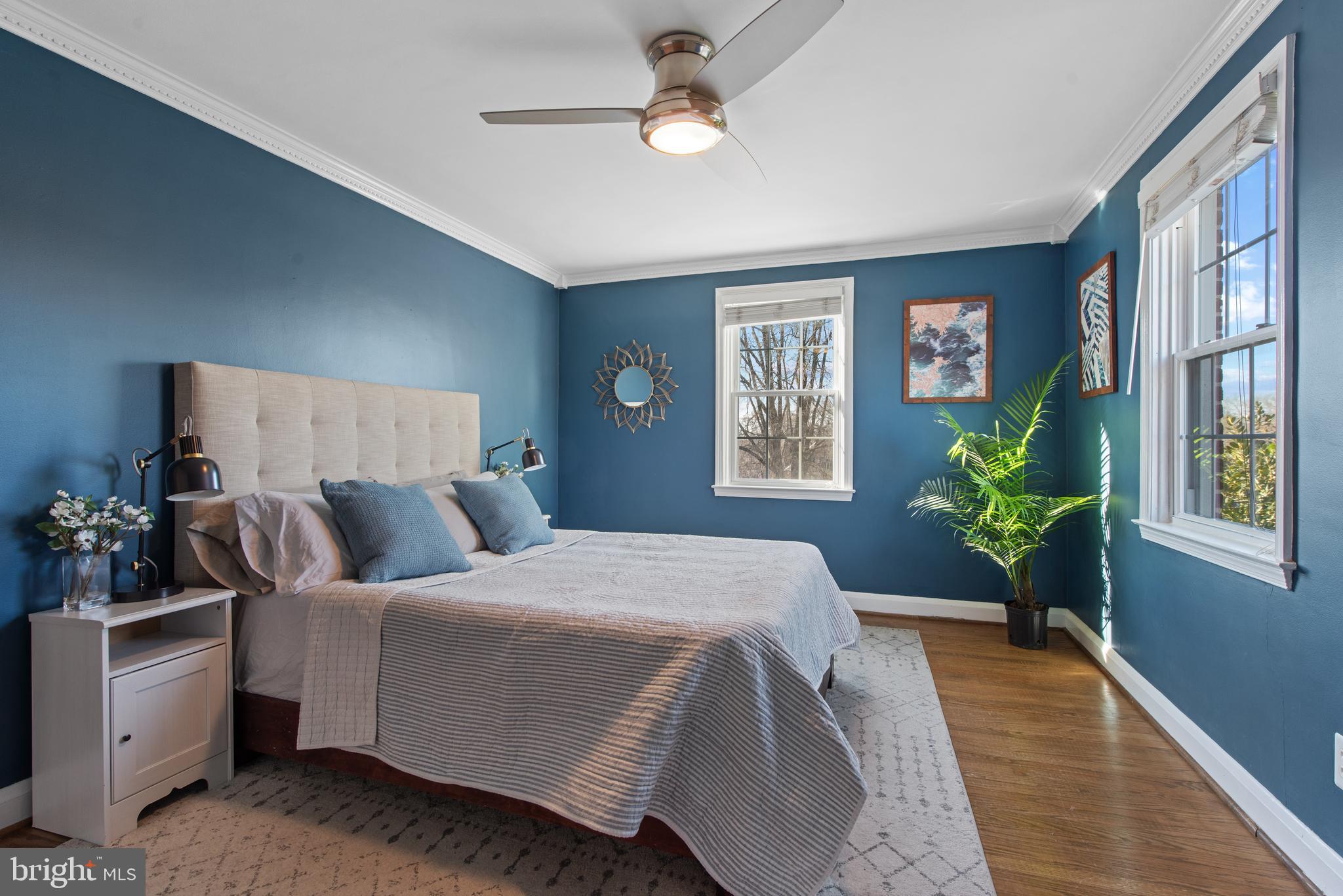 330 Dumbarton Road Baltimore, MD 21212 - Photo 15 of 29 a bedroom with a bed dresser and a window