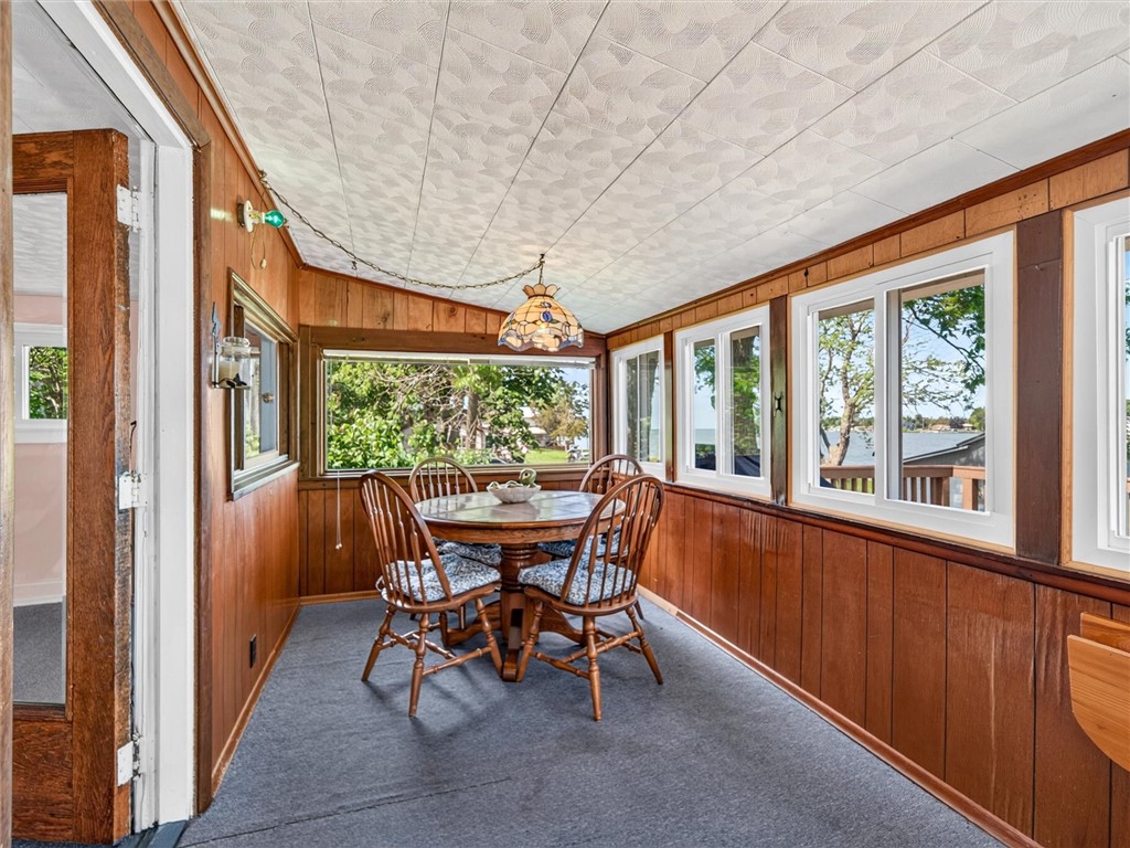 10417 Grandjean Lower Road Henderson, NY 13650 - Photo 16 of 31 Enclosed porch with Waterfront views all around.
