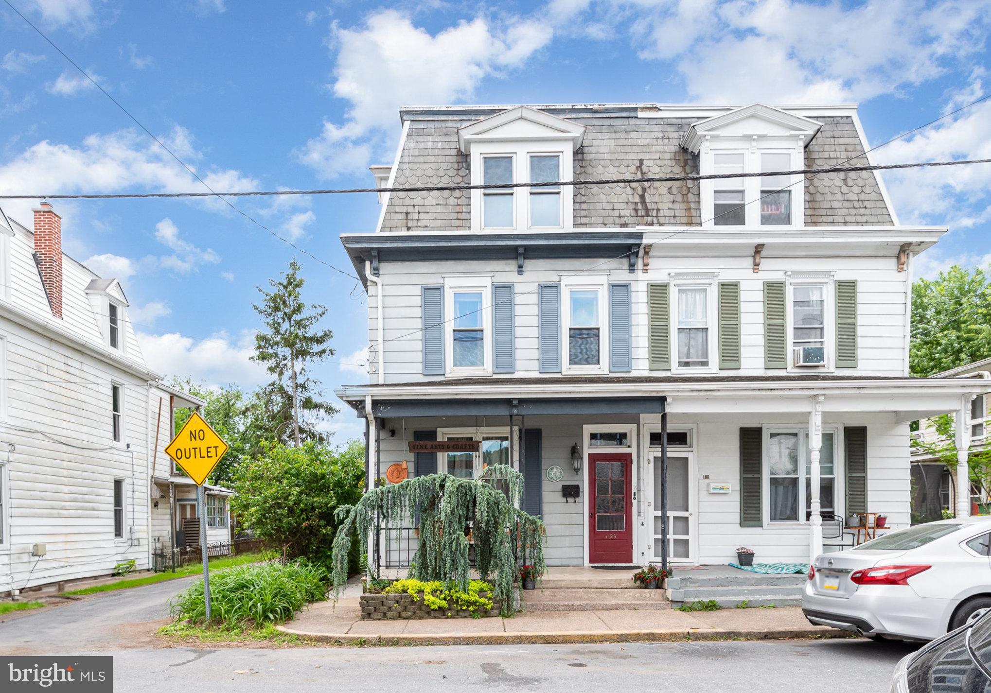 a front view of a multi story residential apartment building